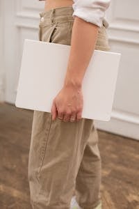 Crop woman with blank notebook